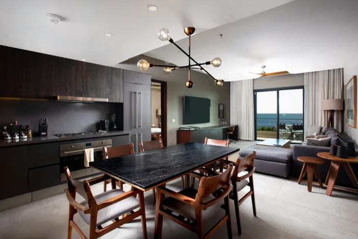 Luxury kitchen and dining area at Angie’s villa in The Cape Residences Los Cabos